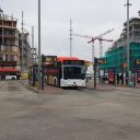 Bus van EBS op station Delft